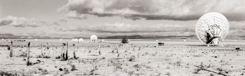 Pietown Array VLA radio telescope array in the New Mexico desert, with large dish antenna